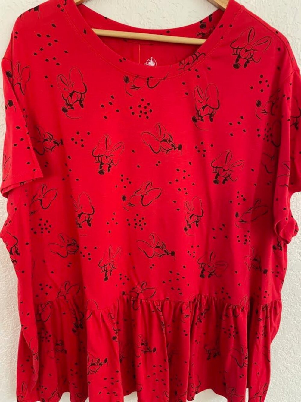 Women's red peplum t-shirt with a tiered ruffle waist